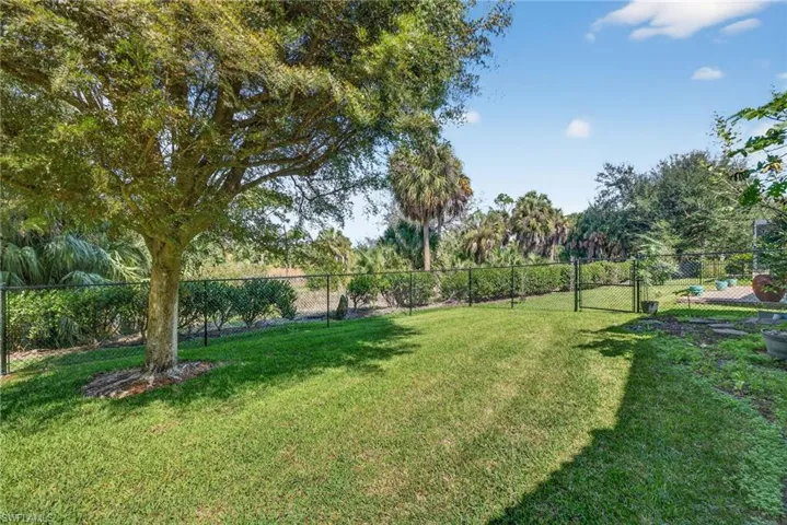 View of yard with a gate