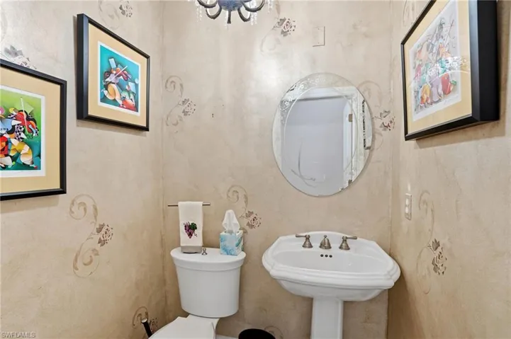 Half bath featuring toilet