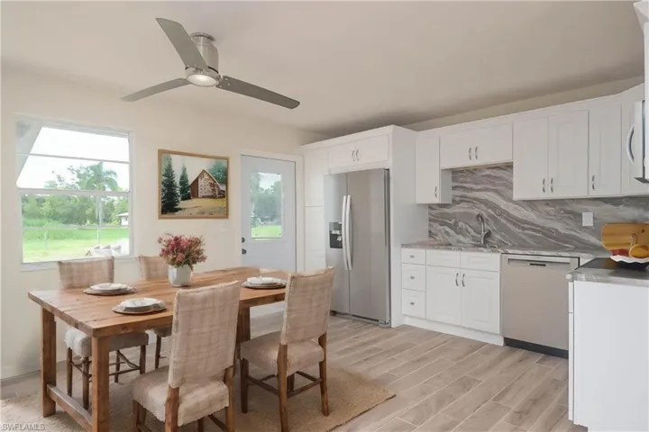 Photo includes reality renovation and/or staging to showcase the possibility of the Kitchen. Design services included with purchase!