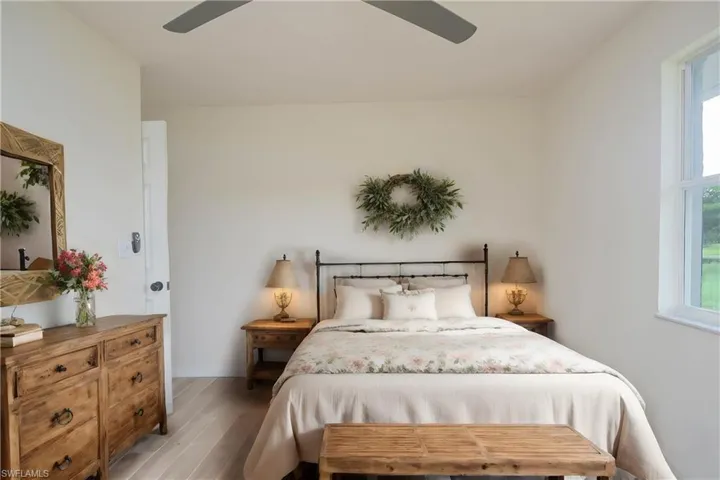 Photo includes reality renovation and/or staging to showcase the possibility of the Primary Bedroom. Design services included with purchase!
