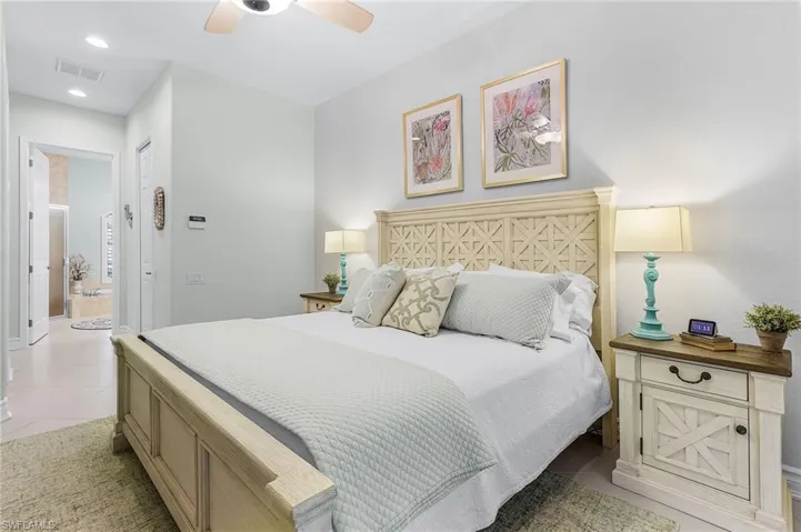 Bedroom has exterior access to pool and hot tub