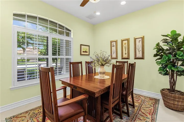 Dining area featuring ceiling fan and recessed lighting