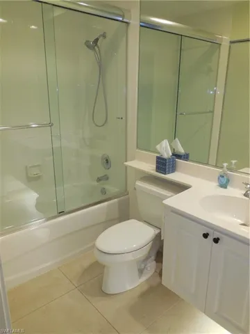 Bathroom with toilet and walk in shower