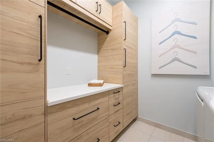 WOW! Tons of storage in the laundry room