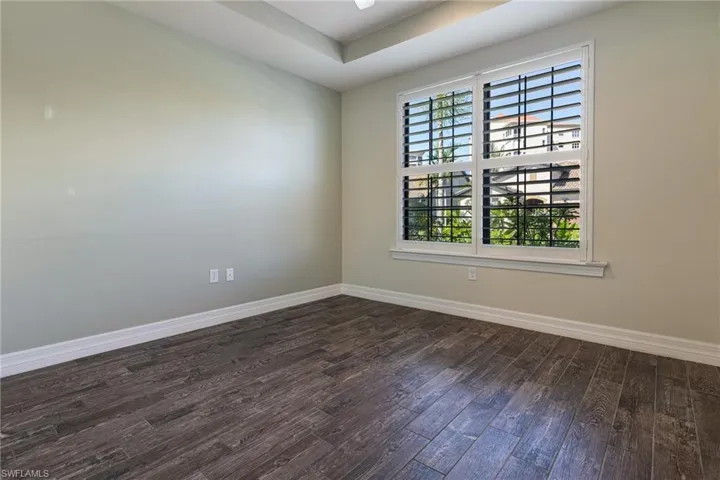 Unfurnished room featuring wood-type flooring