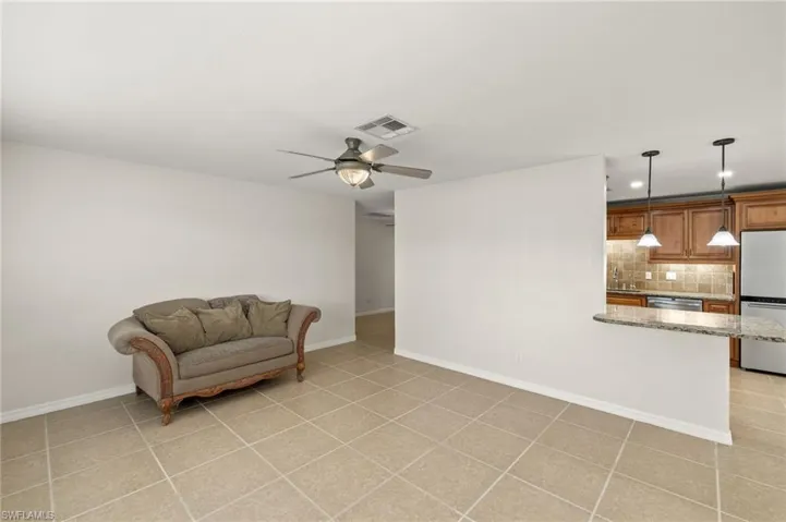 Sitting room featuring light tile patterned floors