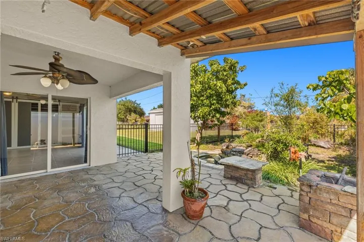 View of patio with ceiling fan