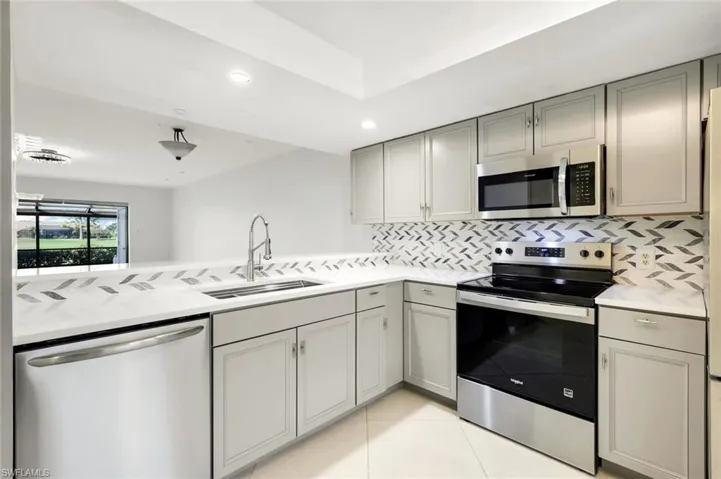 Big SS Kitchen Sink- Tray Lighted Ceiling
