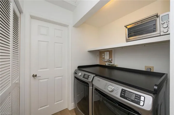 Dedicated laundry area featuring modern appliances