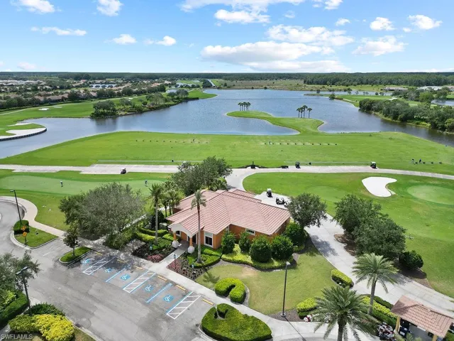 Bird's eye view of a local golf course and a large body of water