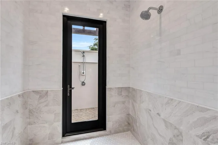 Master bathroom leads to an exterior shower