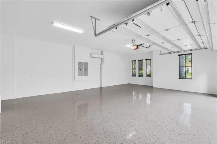Climate controlled garage attached to home room for 2 cars and 2 golf carts. 2nd 2 car garage with storage room.