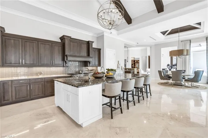 Quartz countertops and state-of-the-art Wolf and Sub-Zero appliances