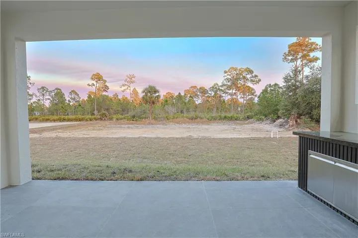 View of patio / terrace featuring view of scattered trees