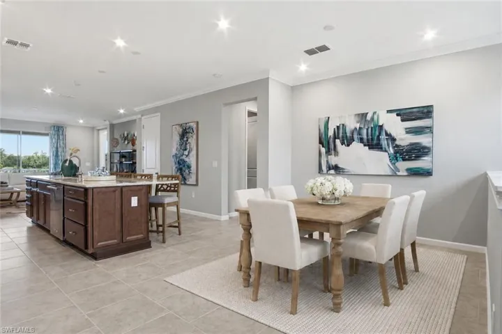 Photo includes reality staging to showcase the possibility of the dining room. Design services included with purchase!