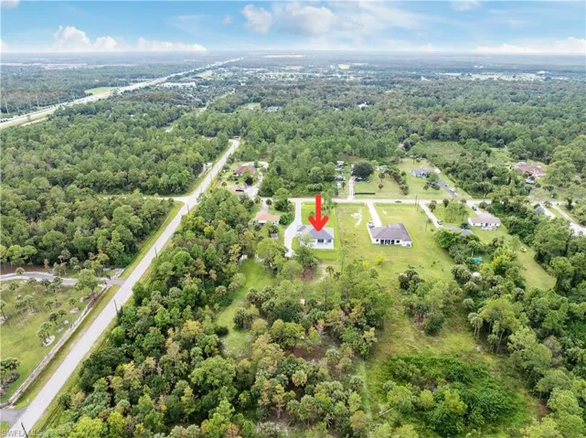 Drone / aerial view featuring a forest view