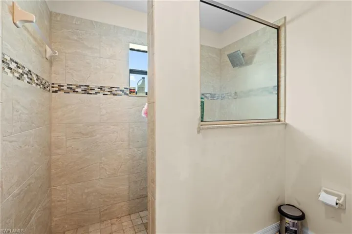Bathroom with tiled shower