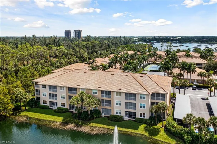 Back of building featuring a water view
