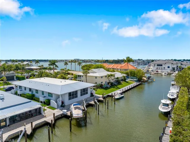 Aerial view of residential area featuring the Canal with direct access to Naples Bay and the Gulf