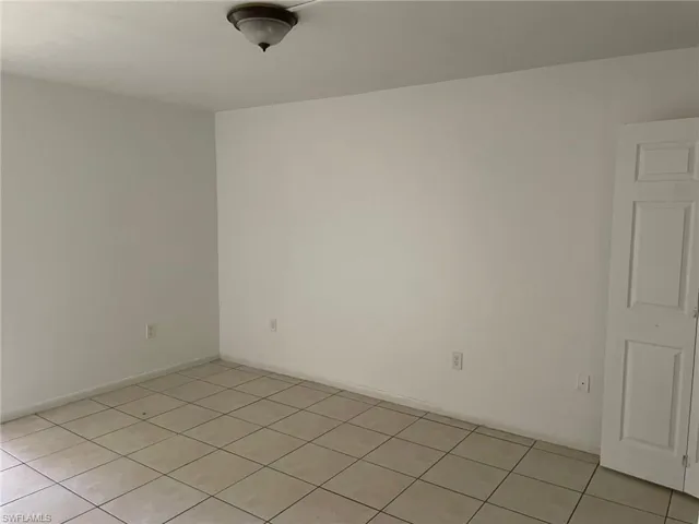 View of tiled empty room