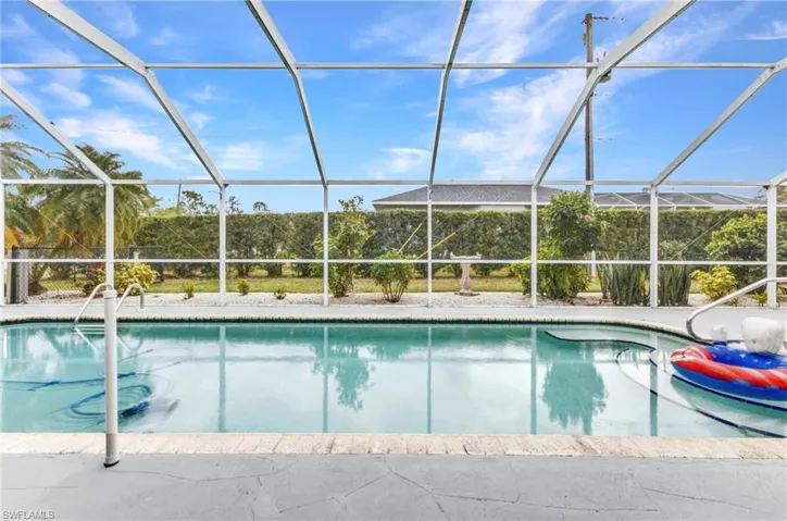 Pool with glass enclosure