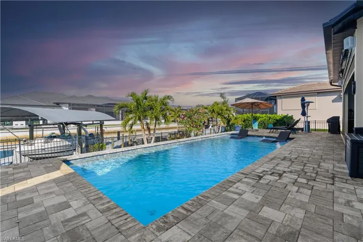 View of pool with fence, a patio area, and a fenced in pool
