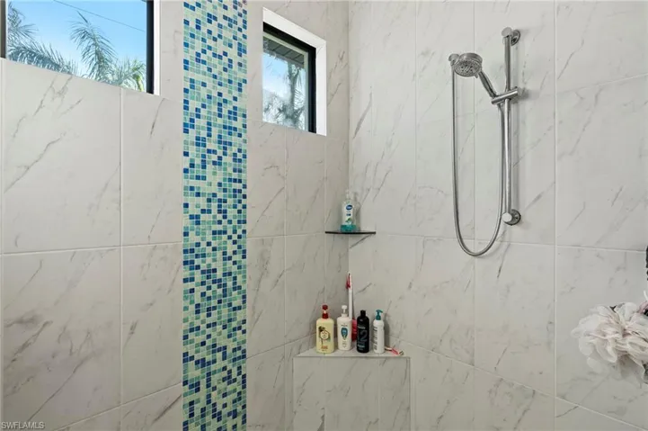 Bathroom with a tile shower