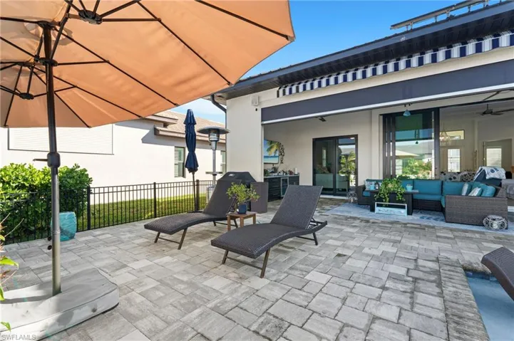 View of patio / terrace with an outdoor hangout area and ceiling fan