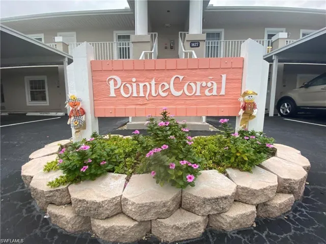 Community sign with covered parking