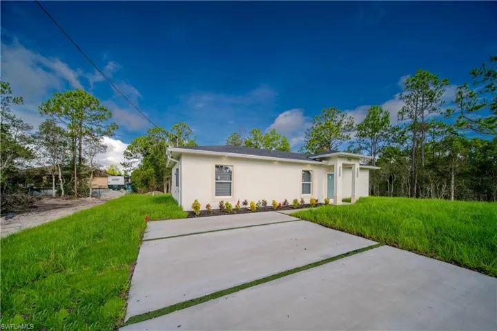 712  Burns S AVE, Lehigh Acres, FL 33974