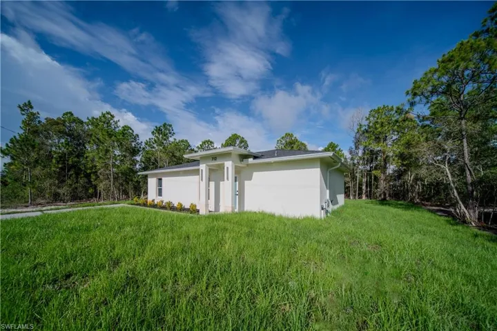 712  Burns S AVE, Lehigh Acres, FL 33974