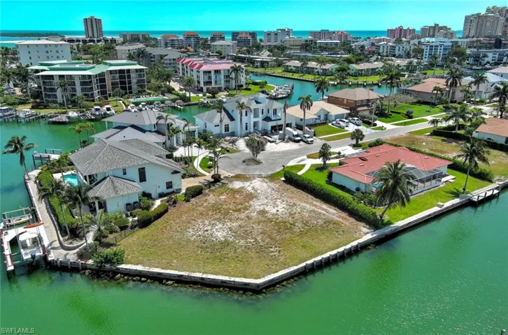 Drone / aerial view with a view of city and a water view