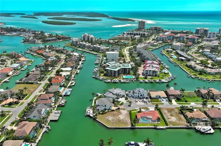 Bird's eye view featuring a city view and a water view