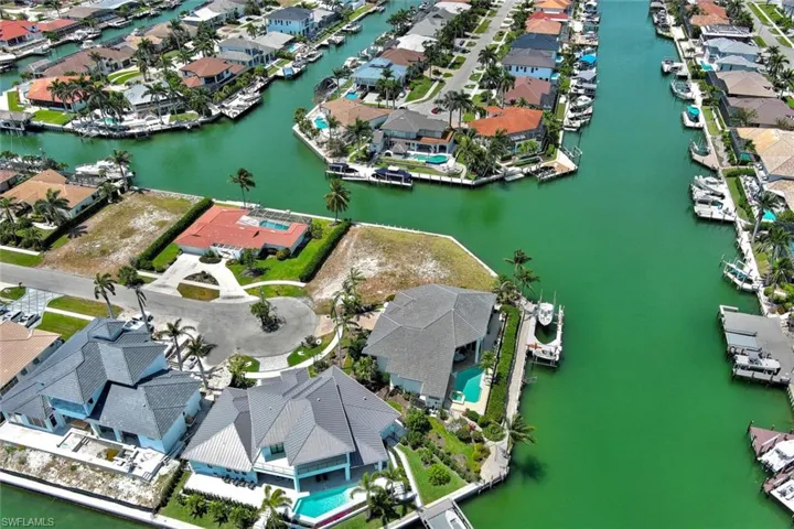 Drone / aerial view featuring a residential view and a water view