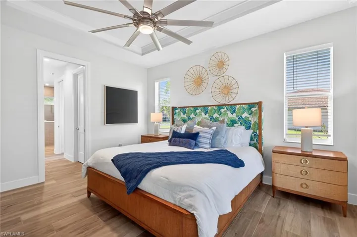 Bedroom featuring light wood-type flooring and ceiling fan