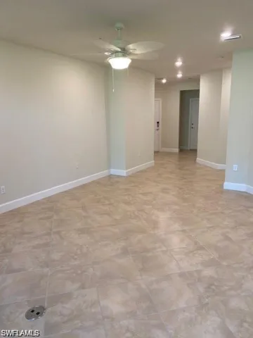 Unfurnished room with a ceiling fan and recessed lighting