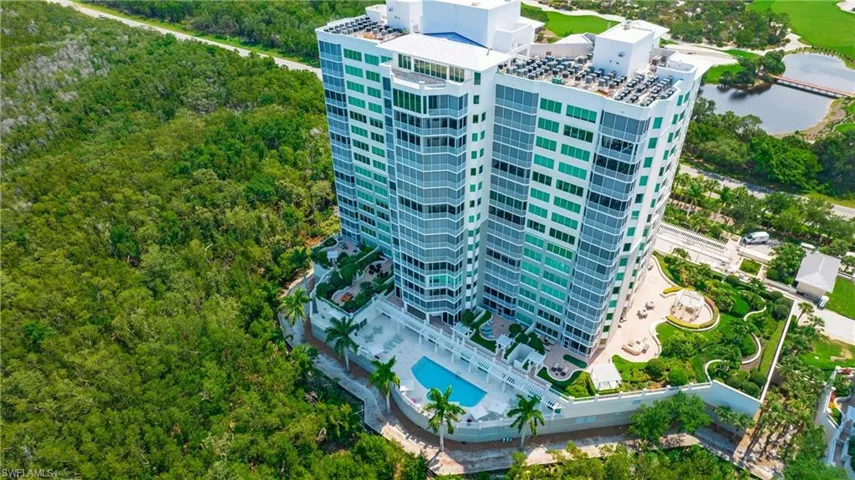 Birds eye view of building and pool