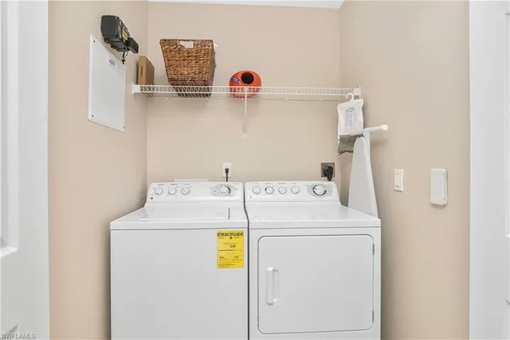 Laundry room featuring independent washer and dryer