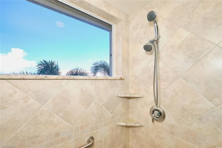 Bathroom view of tiled shower