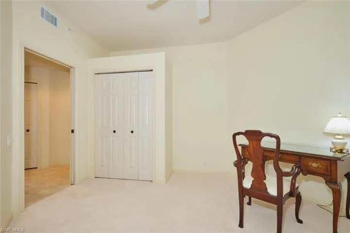 Office with light colored carpet