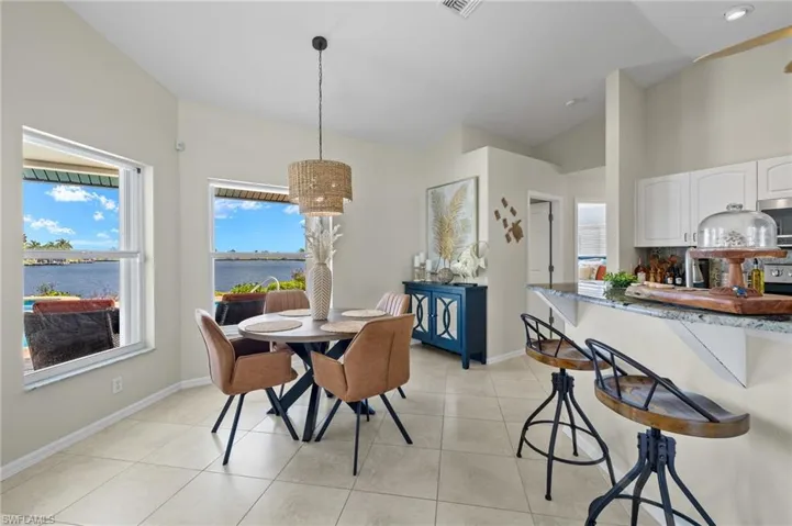Dining with a view and a newly installed light fixture.