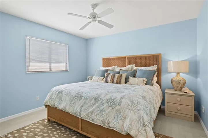 Secondary guest bedroom is also newly tiled with lots of natural light.