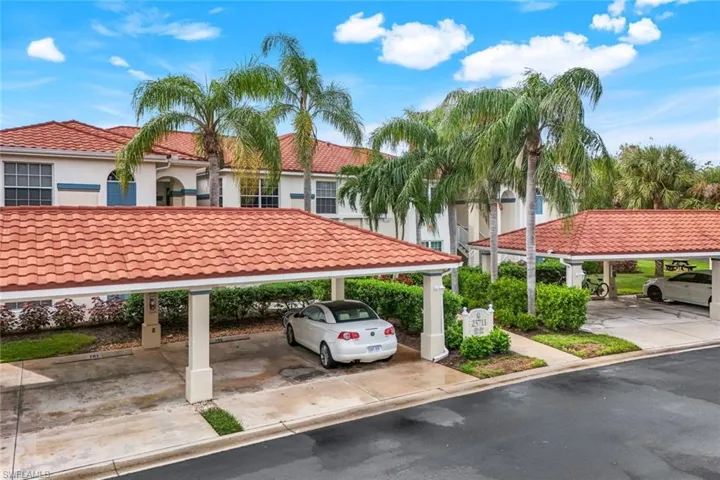 View of car parking with a carport