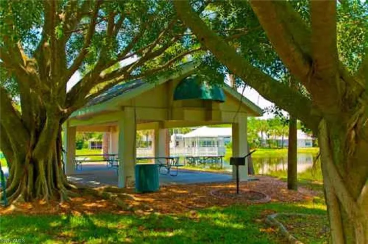 View of home's community with a gazebo and a water view