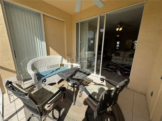 View of patio with ceiling fan
