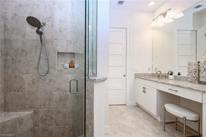 Master Bathroom with walk in shower and vanity