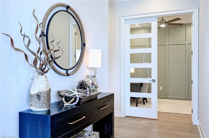 Foyer Hallway featuring light hardwood / wood-style flooring