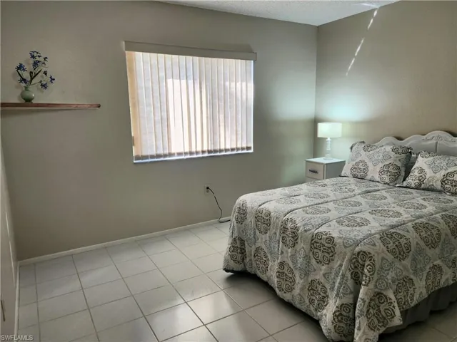 Bedroom 2 offers queen bed