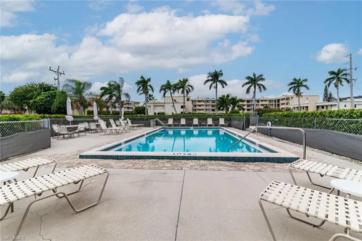 Community pool featuring a patio area