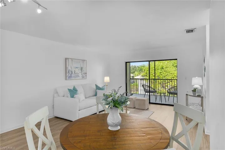 Dining space with light wood-style floors